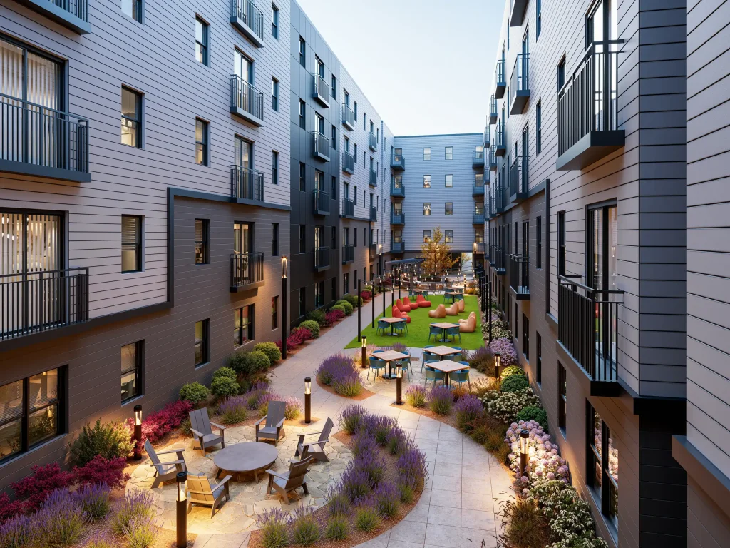 Spirited outdoor courtyard at Signature at Varsity with a putting green, fire pit, and lawn games.