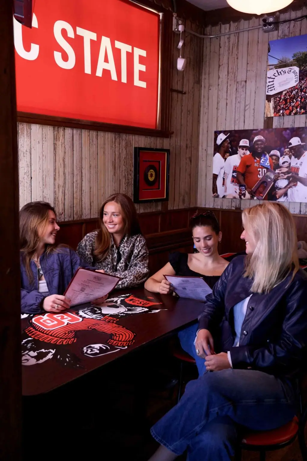 signature at varsity off campus apartments near nc state lifestyle shoot girls booth mitchs tavern